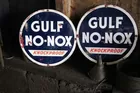 Pair of Small Gulf No Nox advertising signs