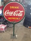 Lollipop Coca-Cola sign and stand