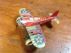 U.S. Wind-up tin toy plane 