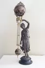 The Huntress Swinging Statue Clock