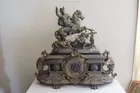 Ornate Ansonia statue mantel clock