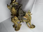 Antique firedogs with cherubs 