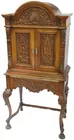 Ornately Carved Bar Cabinet on High Legs