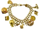 Lot 3374: 14/18K Yellow Gold Pearl Charm Bracelet