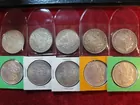 #73 10 Morgan Dollars