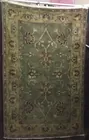 5' x 8' greenish Wool Rug