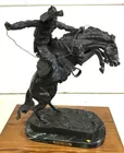 After Frederick Remington ' Bronco Buster ' Bronze