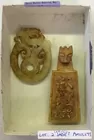 Two Carved Jade? Amulets