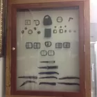 244) Rev. War artifacts in showcase