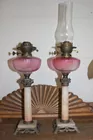 Pair Cranberry oil lamps