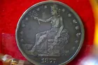 132) 1877S Trade Dollar