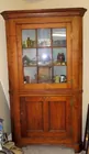 Beautiful pegged corner cabinet