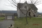 3-Bedroom Tudor-Style Home on 39 Acres