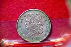 2) 1835 Half cent (AU)