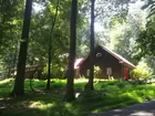 CUSTOM LOG HOME ON 4.73 +/- ACRE LOT