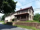 HOUSE & BARN ON .66 M/L ACRE LOT 
