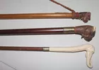 3 figural walking sticks 