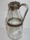 Tin handled milk bottle
