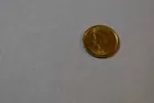 75) $1.00 T-1 Gold Coin