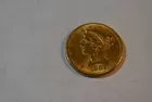 77) 1882 $5.00 Gold, MS-61