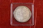 197) 1899 Silver Dollar, VF.