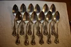 12 Sterling spoons 9.8Tr.oz.