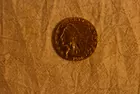 106) 1928 $2&1/2 Indian Gold