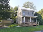 3 BED 1 1/2  HOUSE W/ GARAGE ON .42 ACRE 