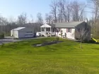 6.7 ACRE COUNTRY PROPERTY W/HOUSE & SHOP 