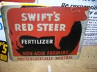 Swift's Red Steer Fertilizer Sign