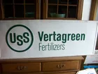 USS Vertagreen sign