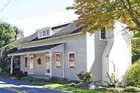 1-1/2 story log & frame 3-bedroom house 