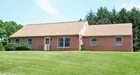 A four (4) bedroom one (1) bathroom ranch house