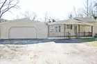 A ranch style four (4) bedroom In Need of Repair