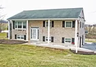 A 3-bedroom bi-level house with 2-car garage