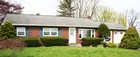 A brick three (3) bedroom ranch style house w/ att