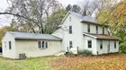 A 2-story house (in need of repair) on 3.70 acres