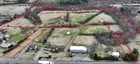 31+ ACRES WITH SEVERAL HORSE PADDOCKS & 4 RUN IN S