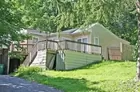 A brick & sided raised ranch house on a 1.80-acre 