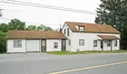 A 1-1/2-story 3-bedroom house in need of TLC