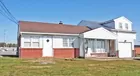 A four (4) bedroom1-1/2 story house