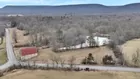 8.8 ACRE PARTIALLY WOODED LOT W/ STONE MILL