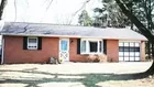 A brick & sided 2-bedroom ranch style house