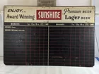 Lot# 324 - LARGE SUNSHINE BEER MASONITE 