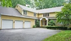 A 1.04-acre 2-story 5-bedroom house w/ garage