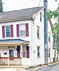 A 2-1/2 story 3-bedroom duplex house