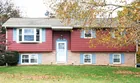 A brick & sided 3-bedroom house on 0.68-acre lot