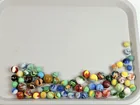 ASSORTMENT OF VARIOUS MARBLES