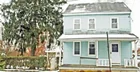 A 2-1/2 story 2-bedroom house (needing renovation)
