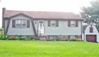 A 3-bedroom 2-story house w/ detached garage